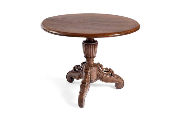 Antique pedestal table with delicately carved pedestal